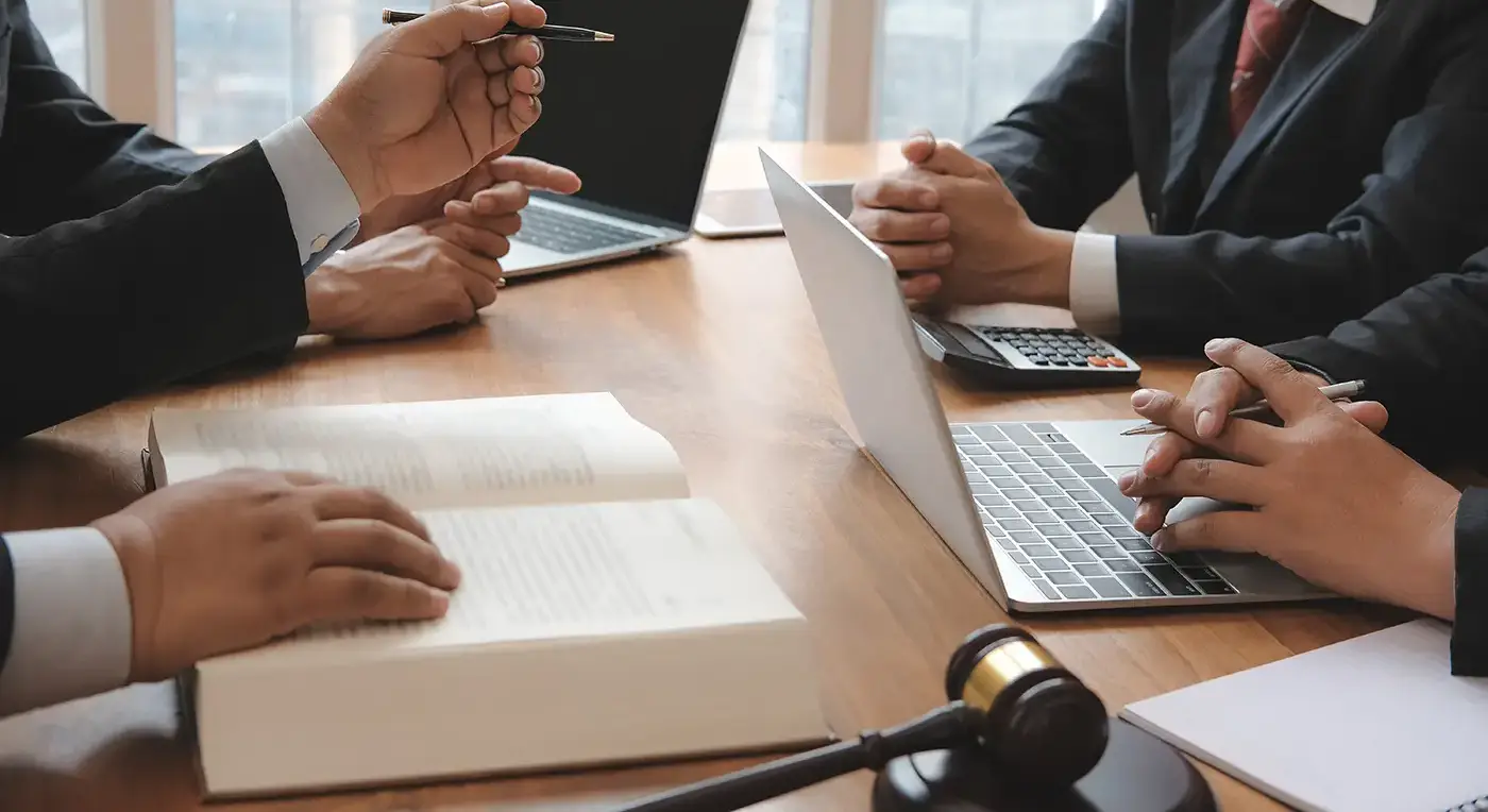 Businessmen at a table working