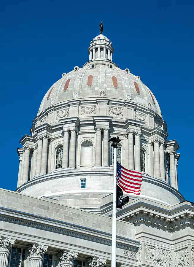 Capitol building with American flag